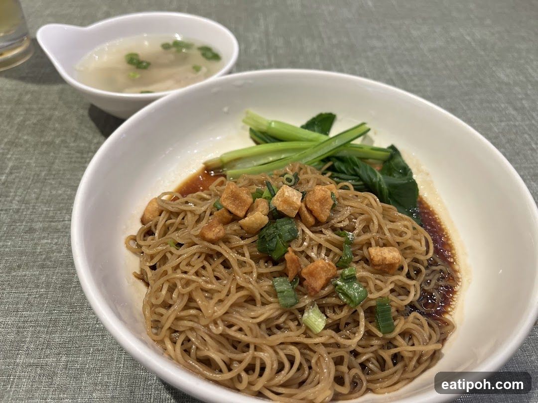 Noodles with garnish and soup