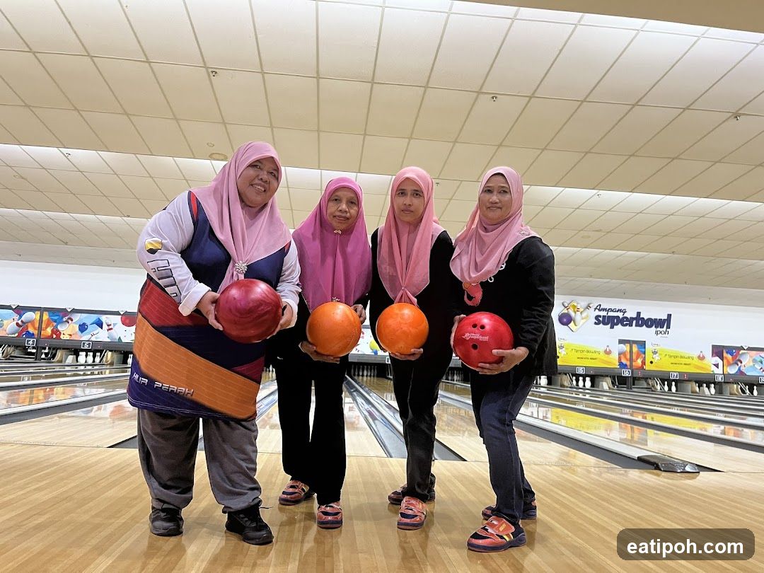 Four women at bowling alley