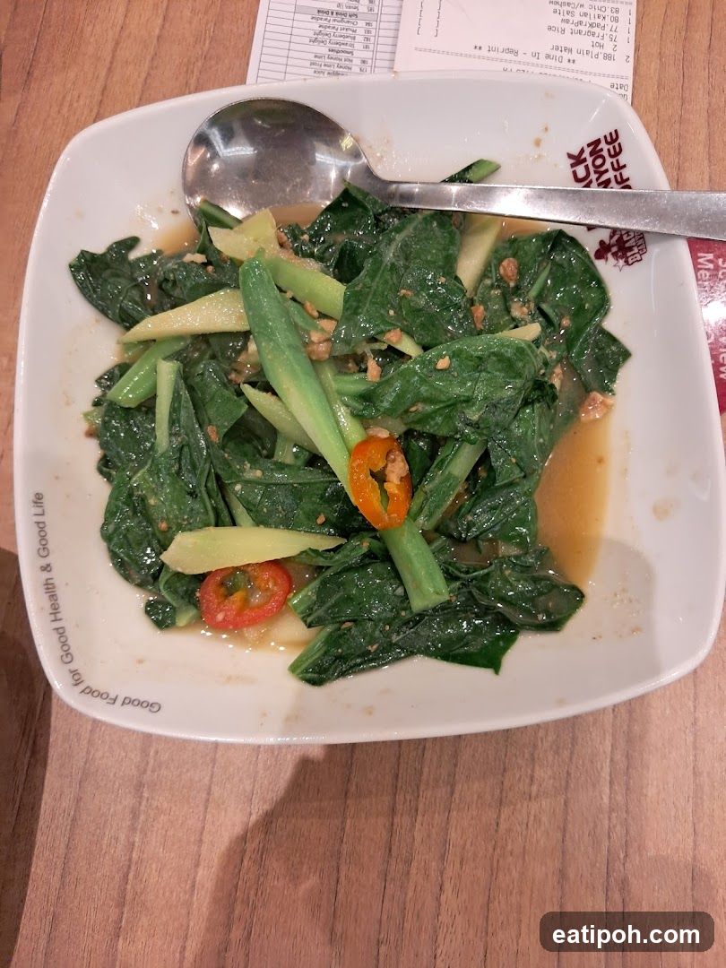 Stir-fried greens with chili and ginger