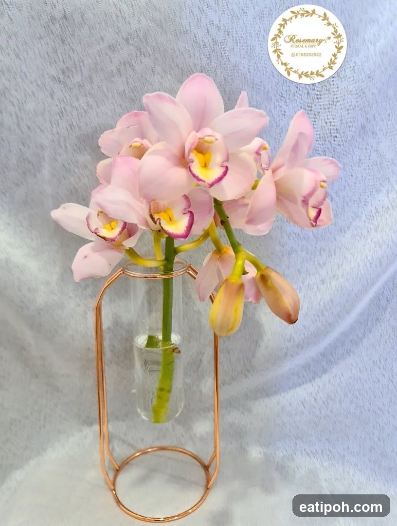 Orchid arrangement in vase