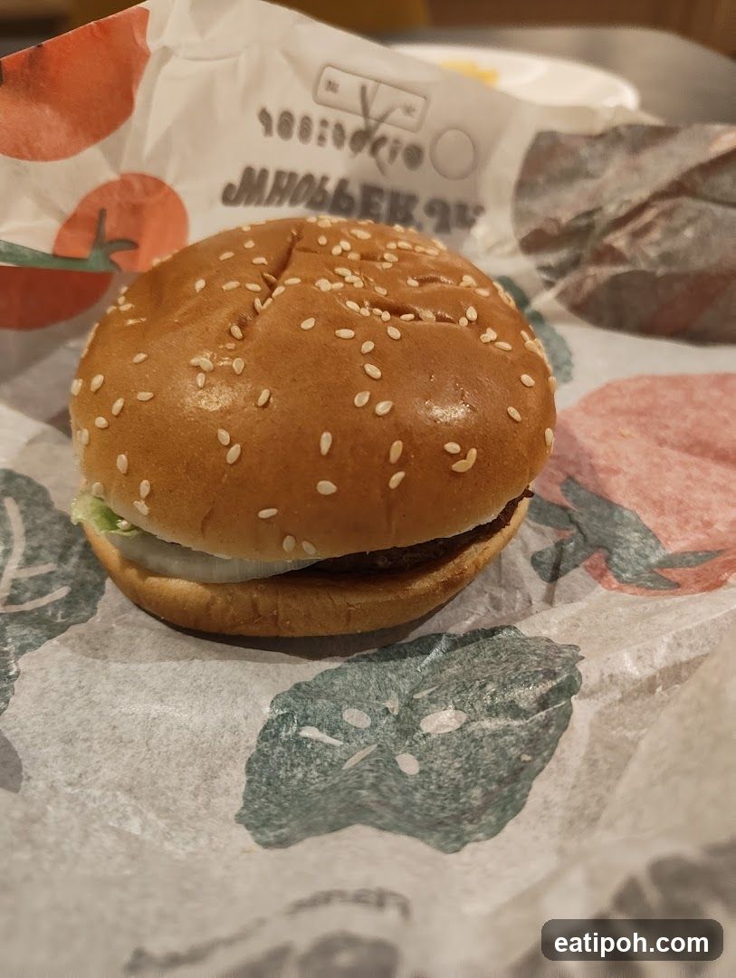 Hamburger on branded paper wrapper