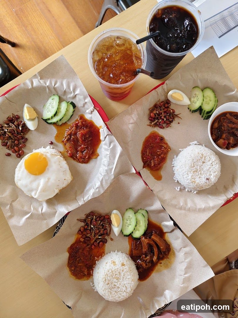 Food served on paper wraps with drinks
