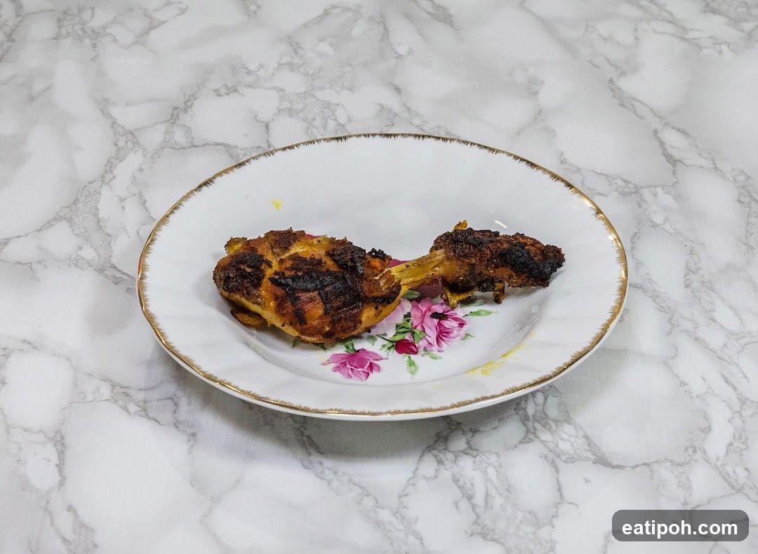 Grilled Chicken Leg on Floral Plate