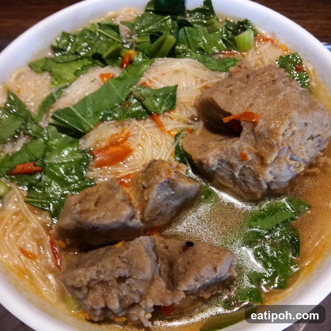 Noodle Soup with Meat and Greens