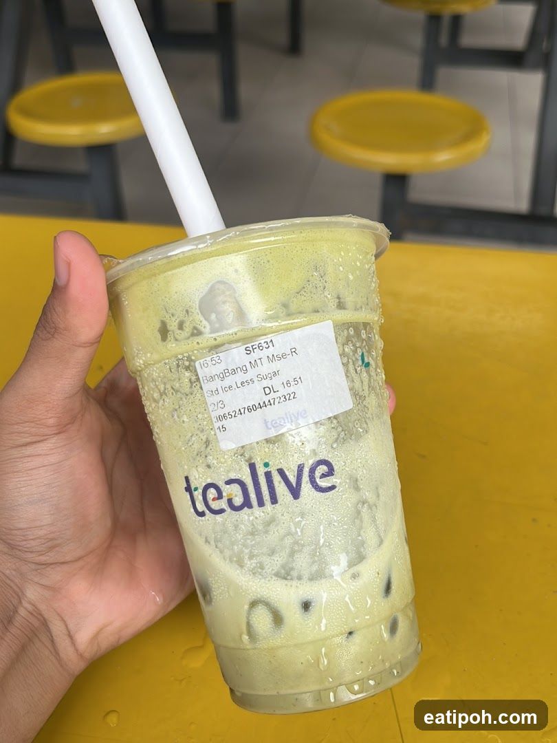 Tealive drink held in hand