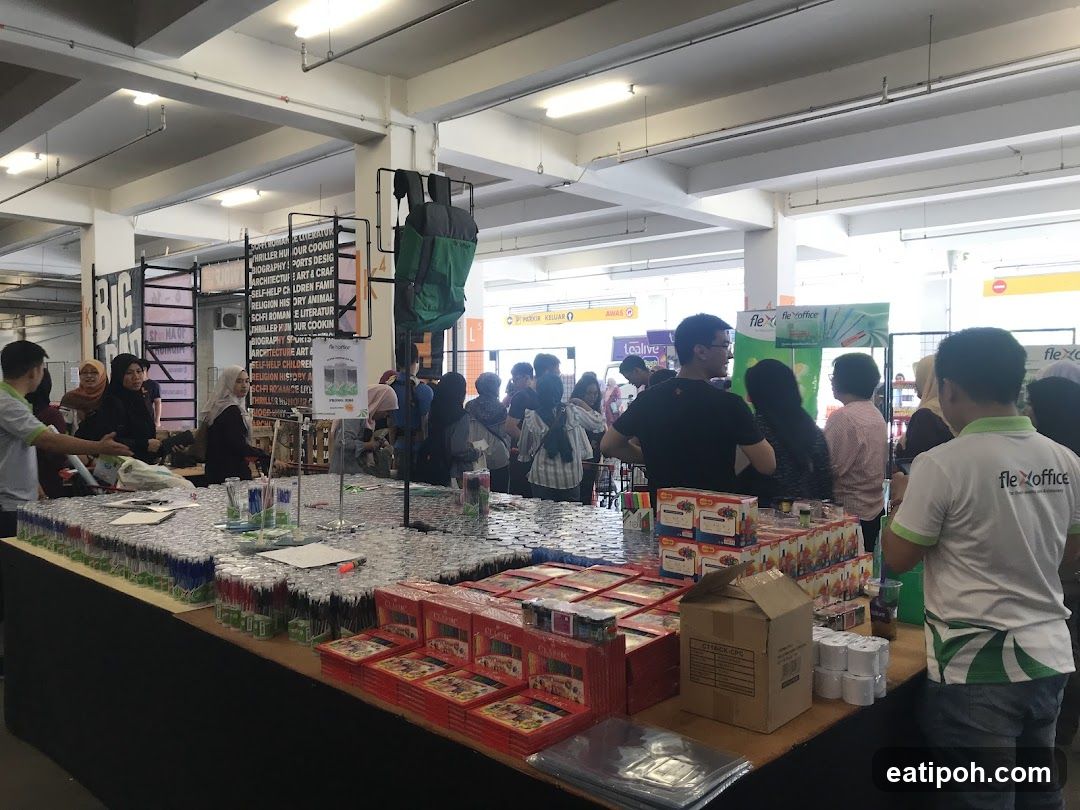 Indoor market stall with products and visitors