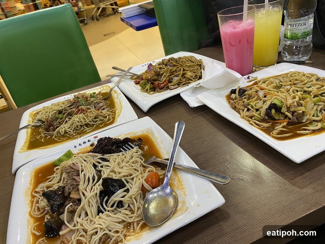 Dining Table with Noodles and Drinks