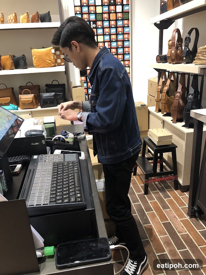 Man at Checkout Counter