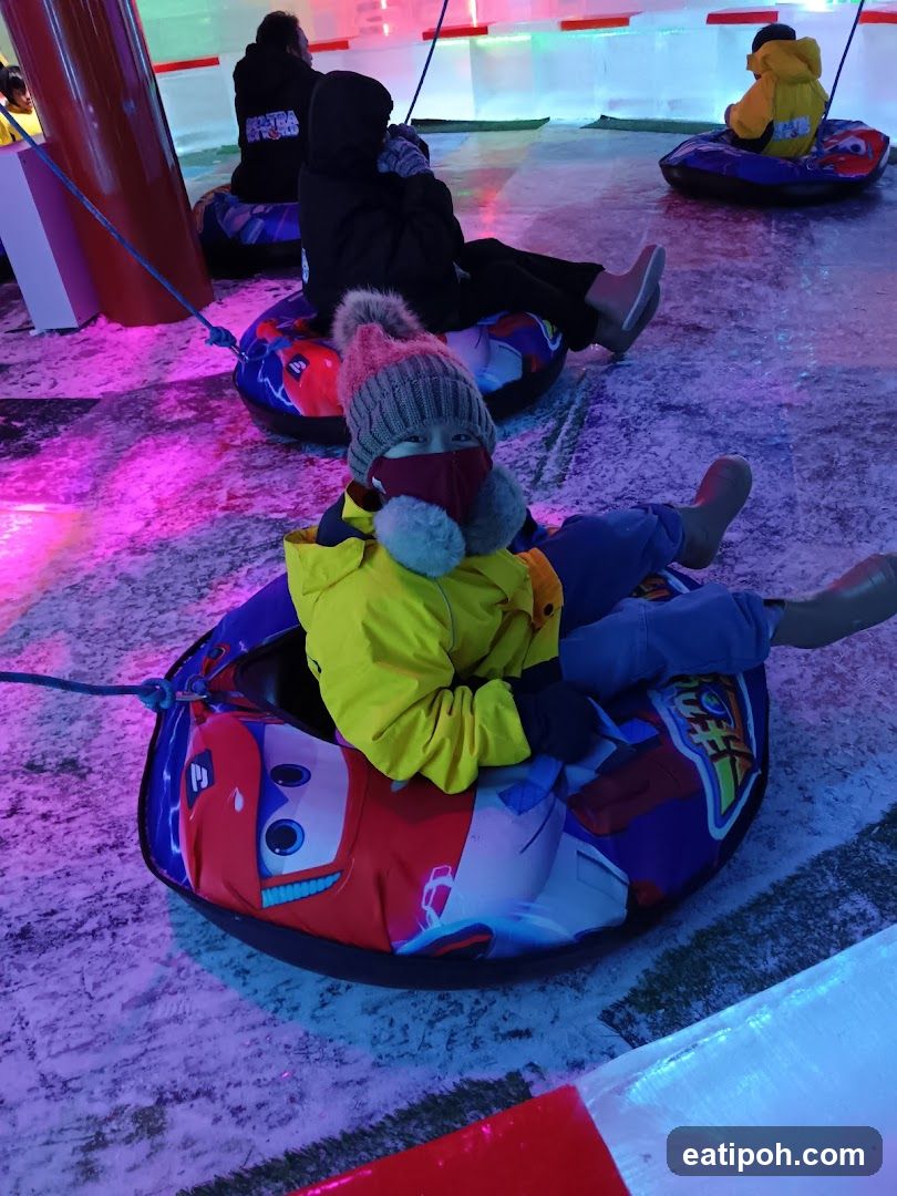 Indoor ice slide attraction