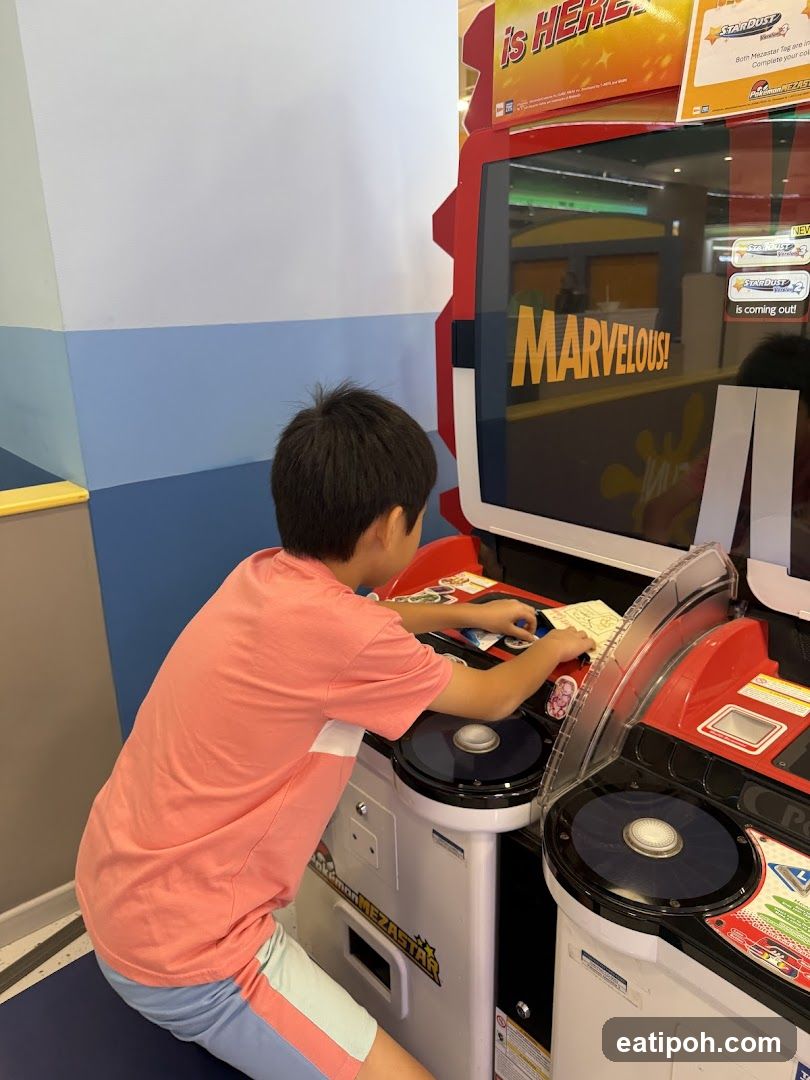 Child playing arcade game