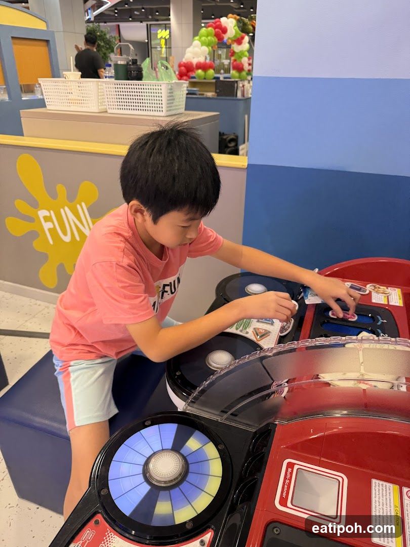 Child playing arcade game inside store