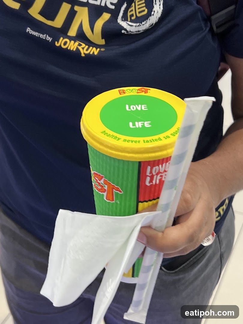 Person holding beverage cup