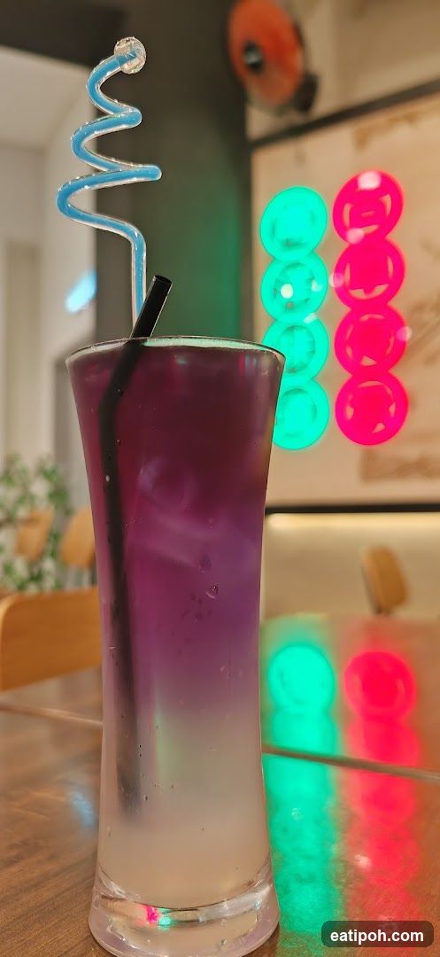 Purple Drink with Spiral Straw