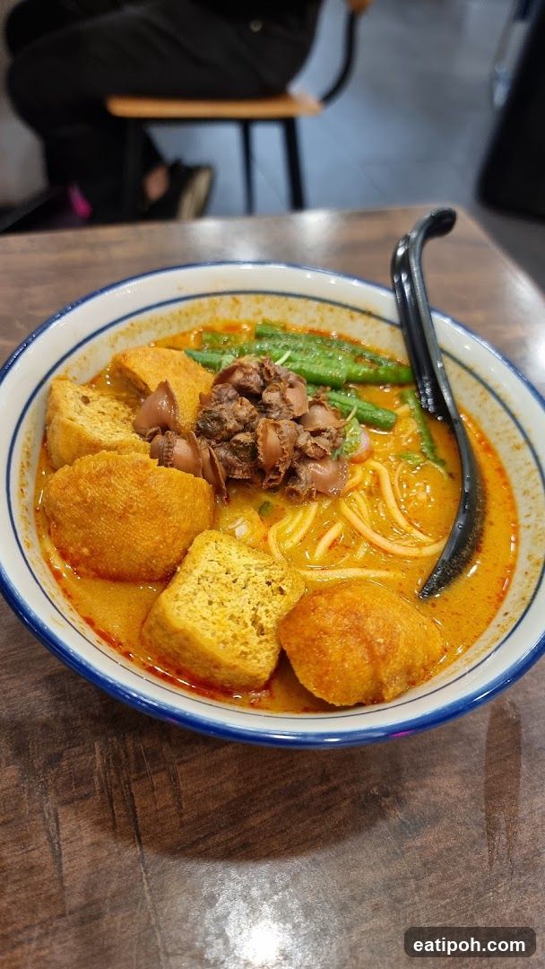 Laksa bowl on wooden table