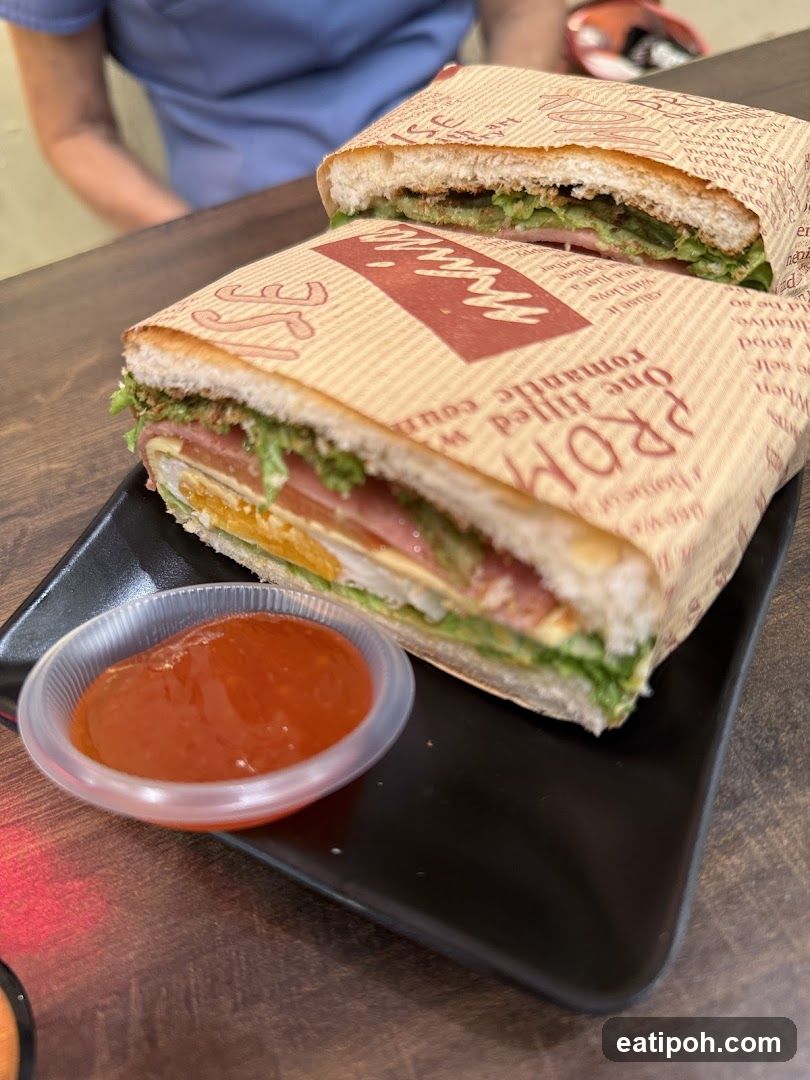 Sandwich and Sauce on Plate