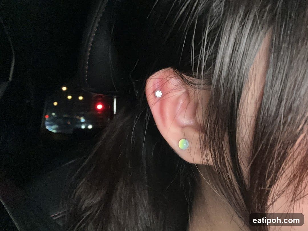 Close-up of ear with earrings