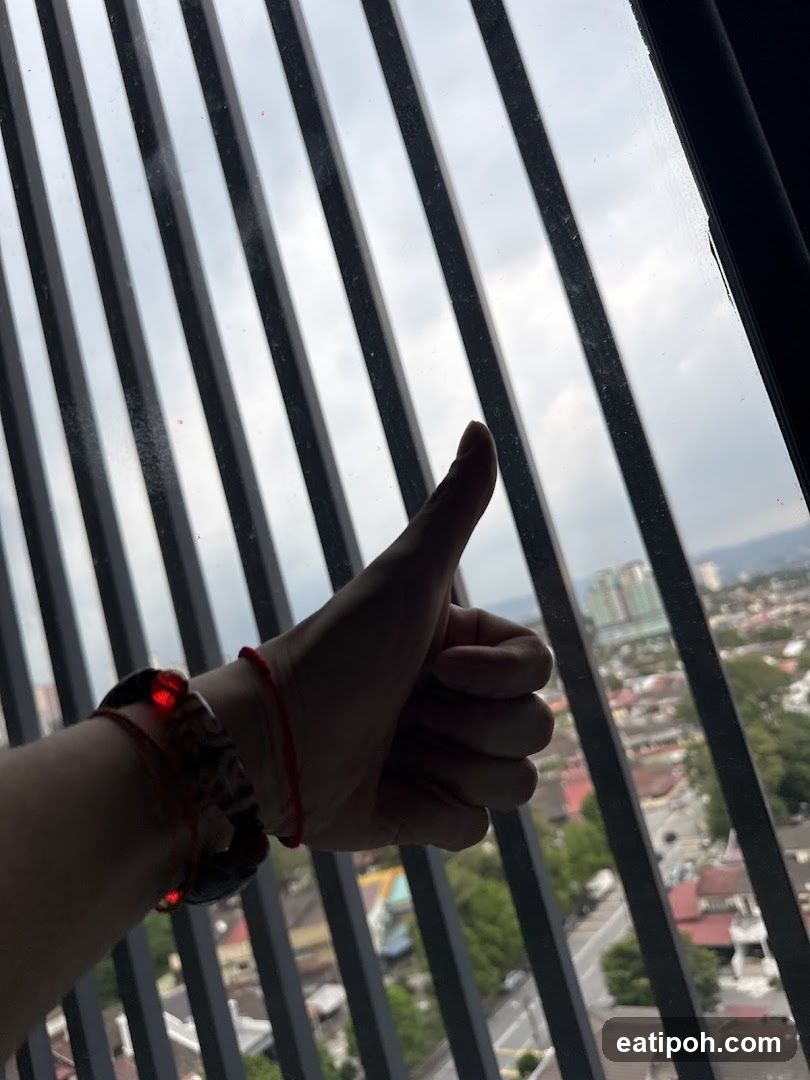 Hand gesture from balcony