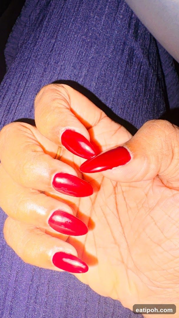 Hand with Red Nails