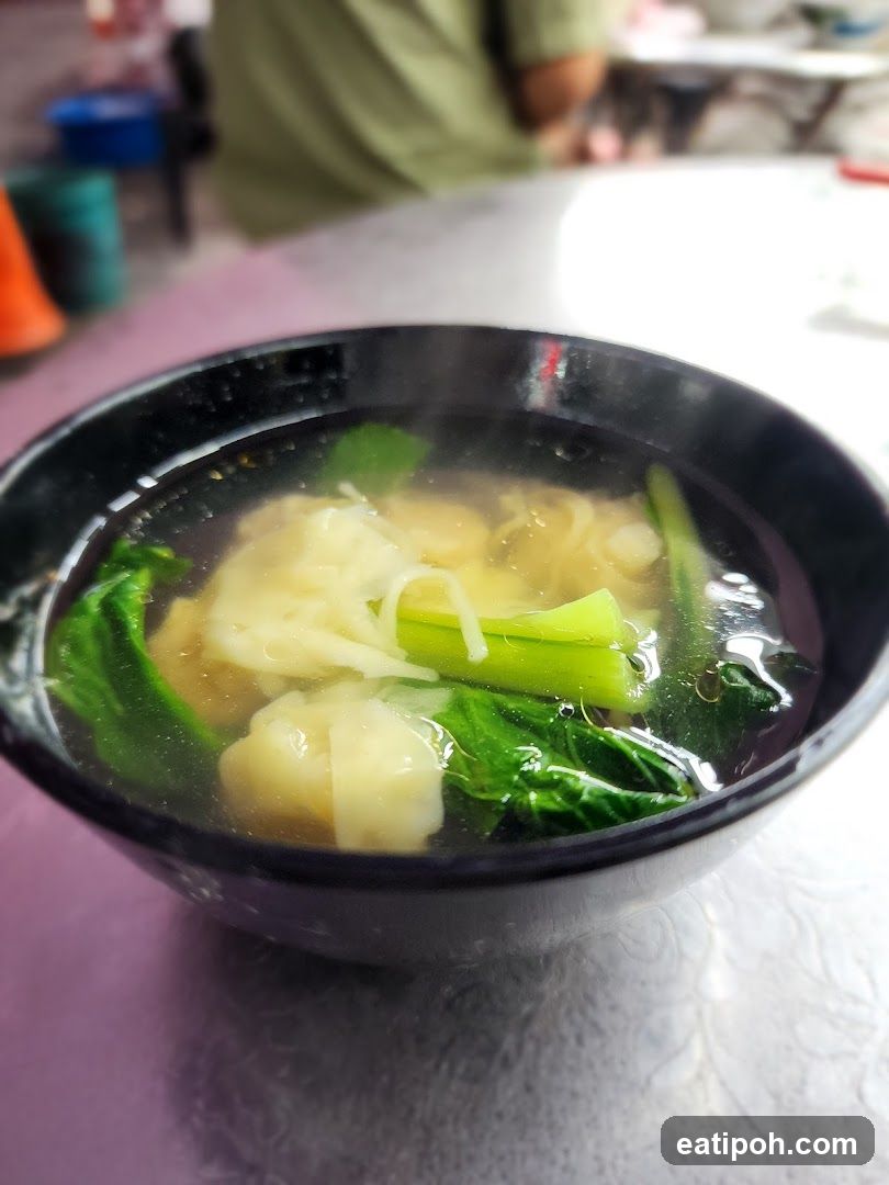 Wonton Soup in Black Bowl