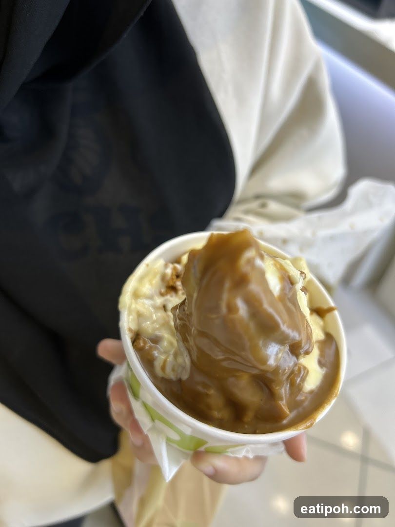 Hand holding dessert cup