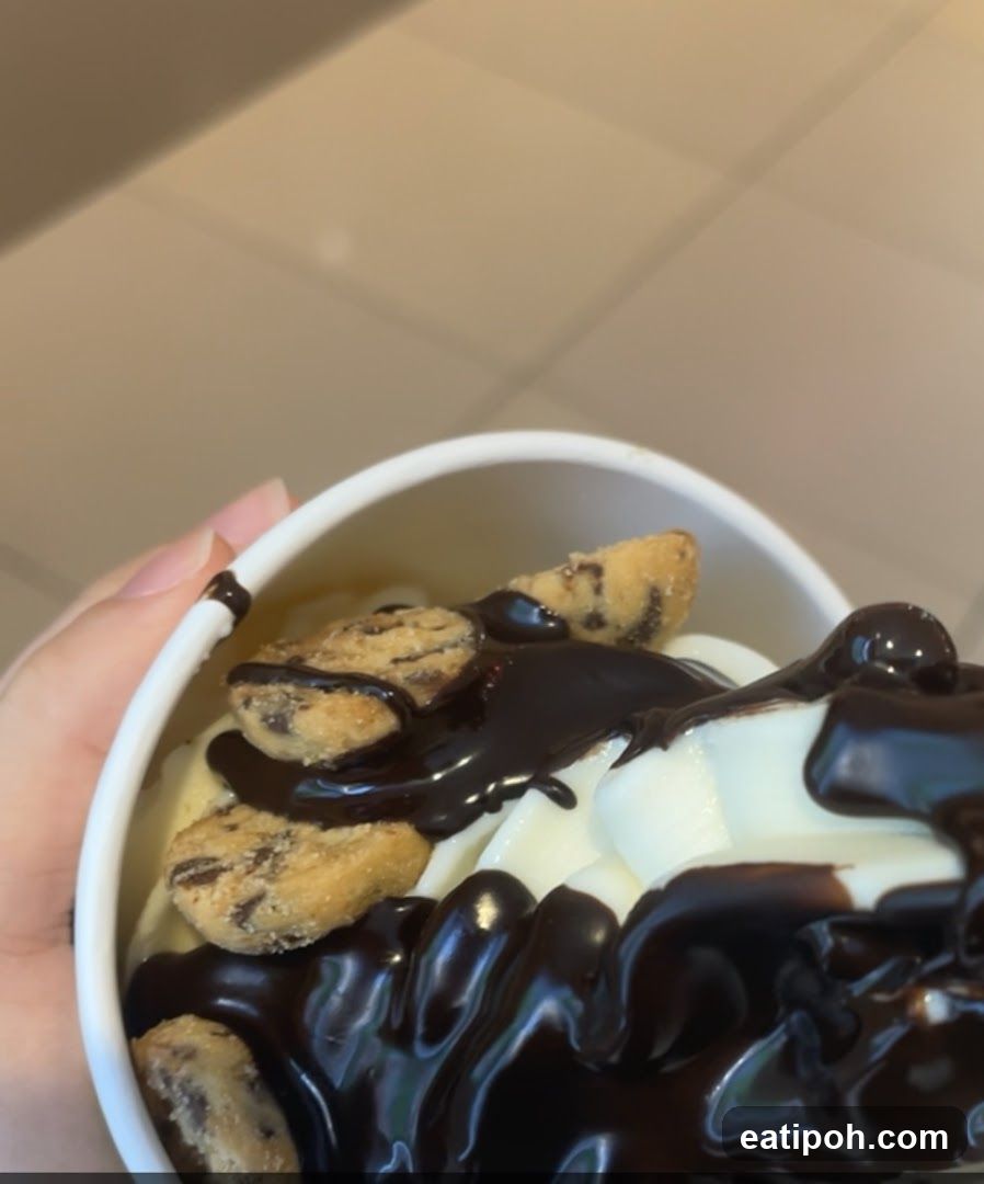 Hand holding dessert cup