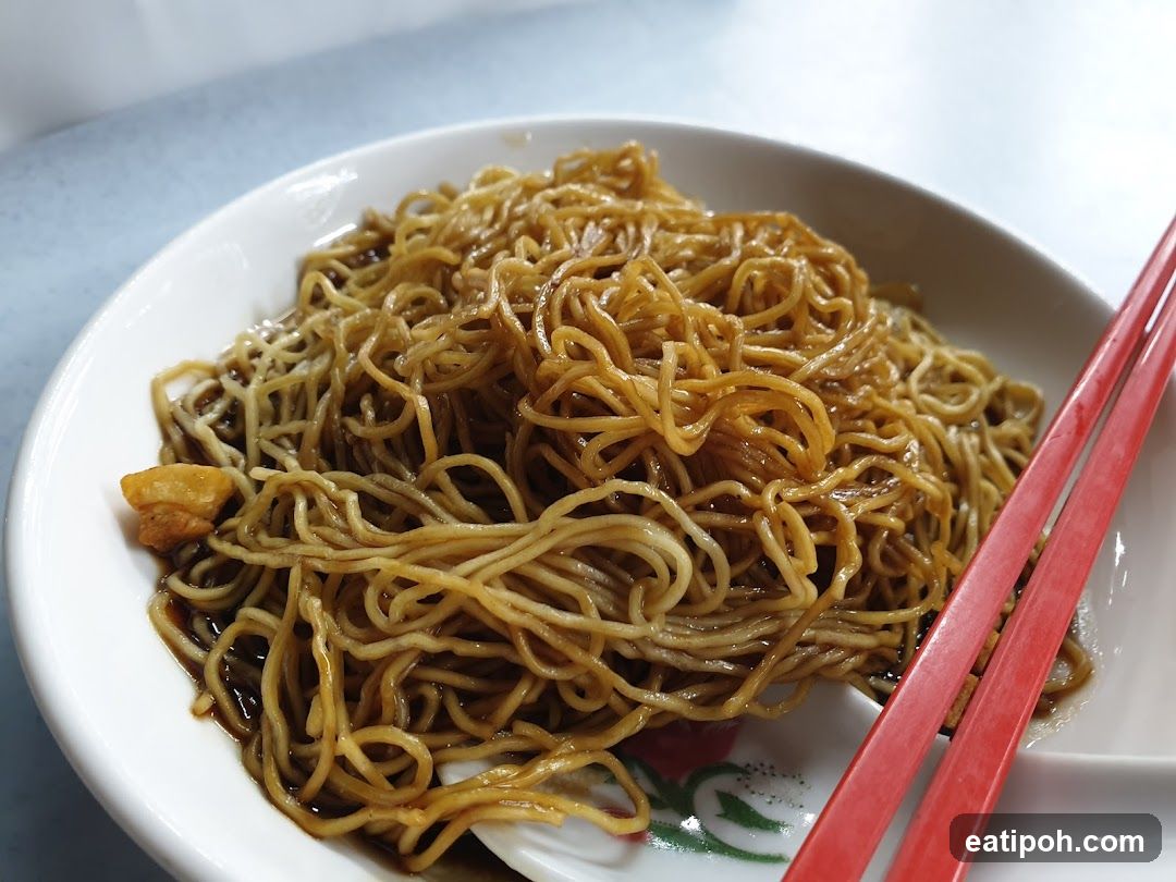 Noodles on Plate with Chopsticks