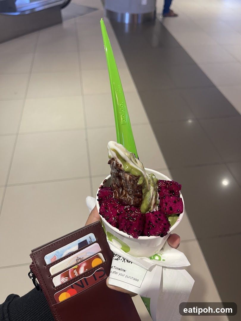 Handheld Dessert with Dragon Fruit and Green Icing