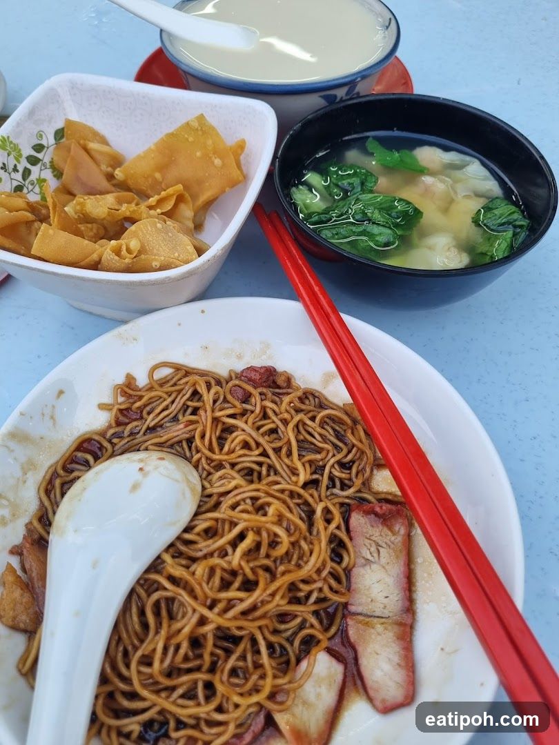 Food Plate with Noodles, Soup, and Side Dishes