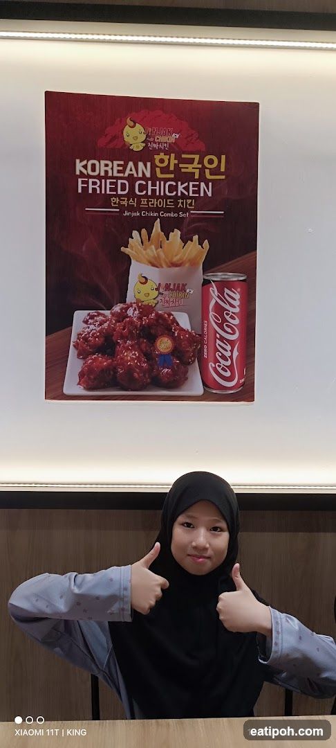Person in restaurant interior