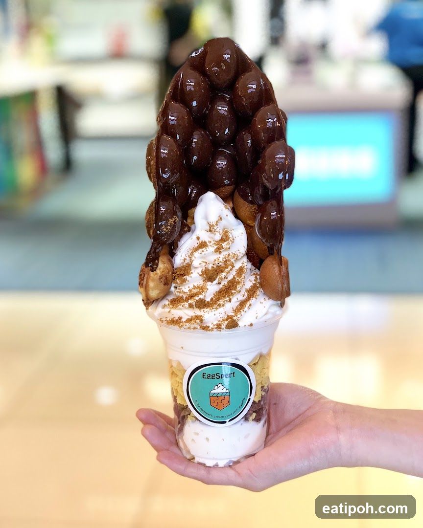 Hand holding dessert cup