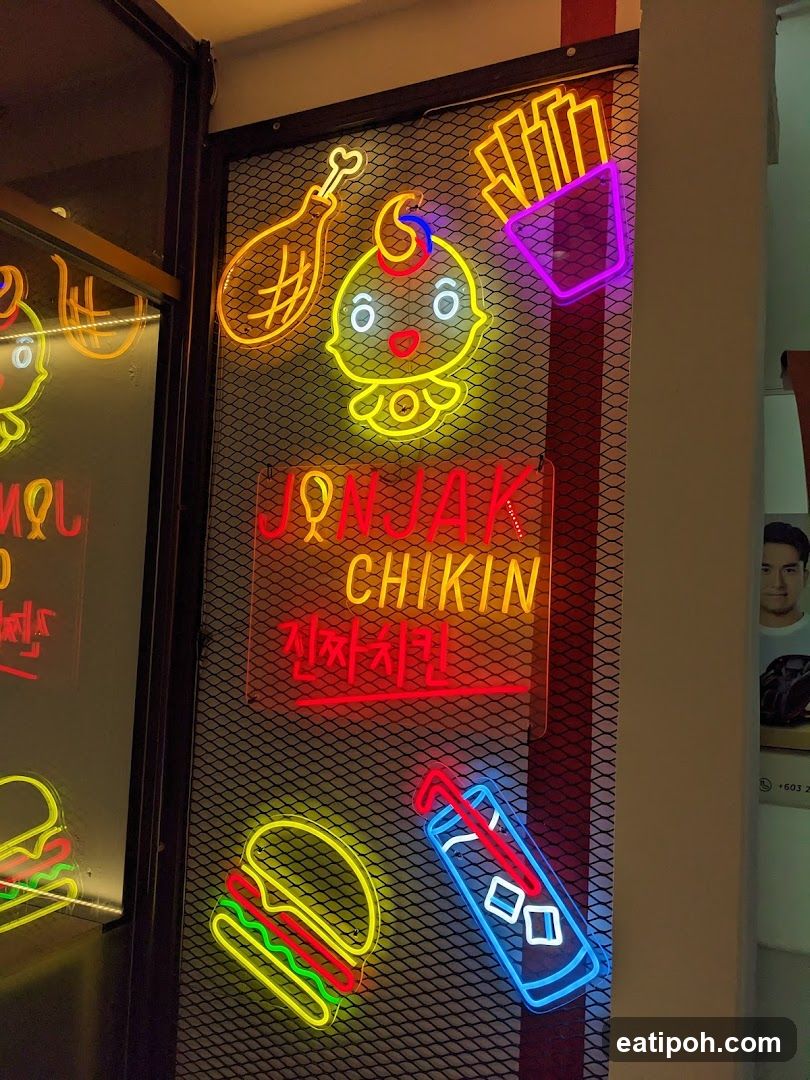 Jonjak Chikin storefront neon sign