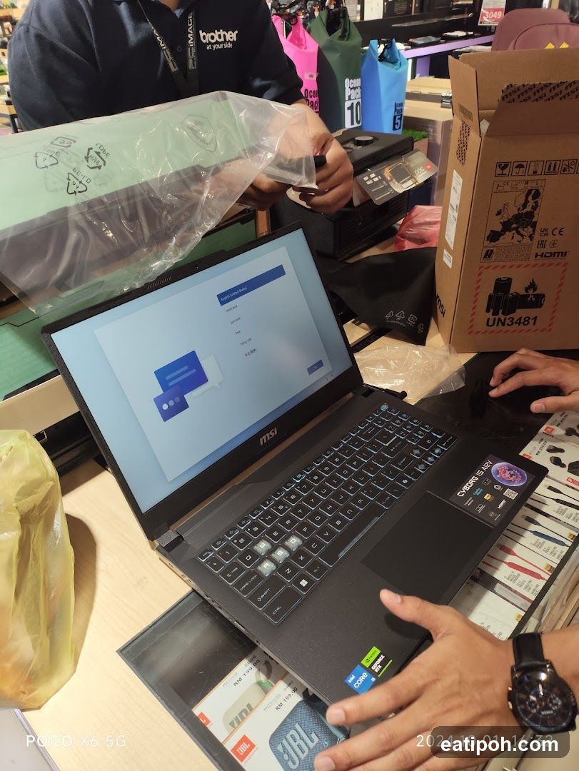Laptop Unboxing at Retail Counter