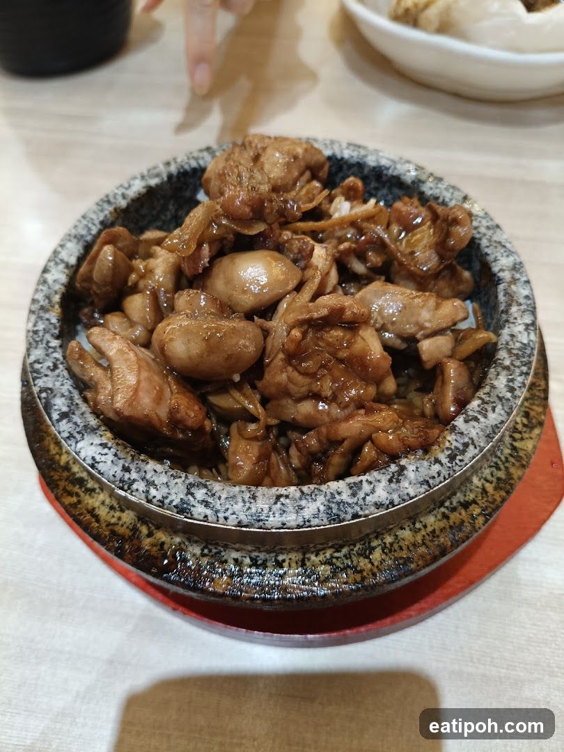Stoneware dish of cooked meat
