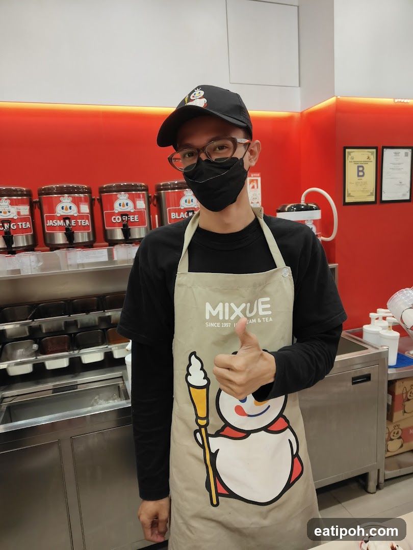 Staff Member at Mixue Tea Shop