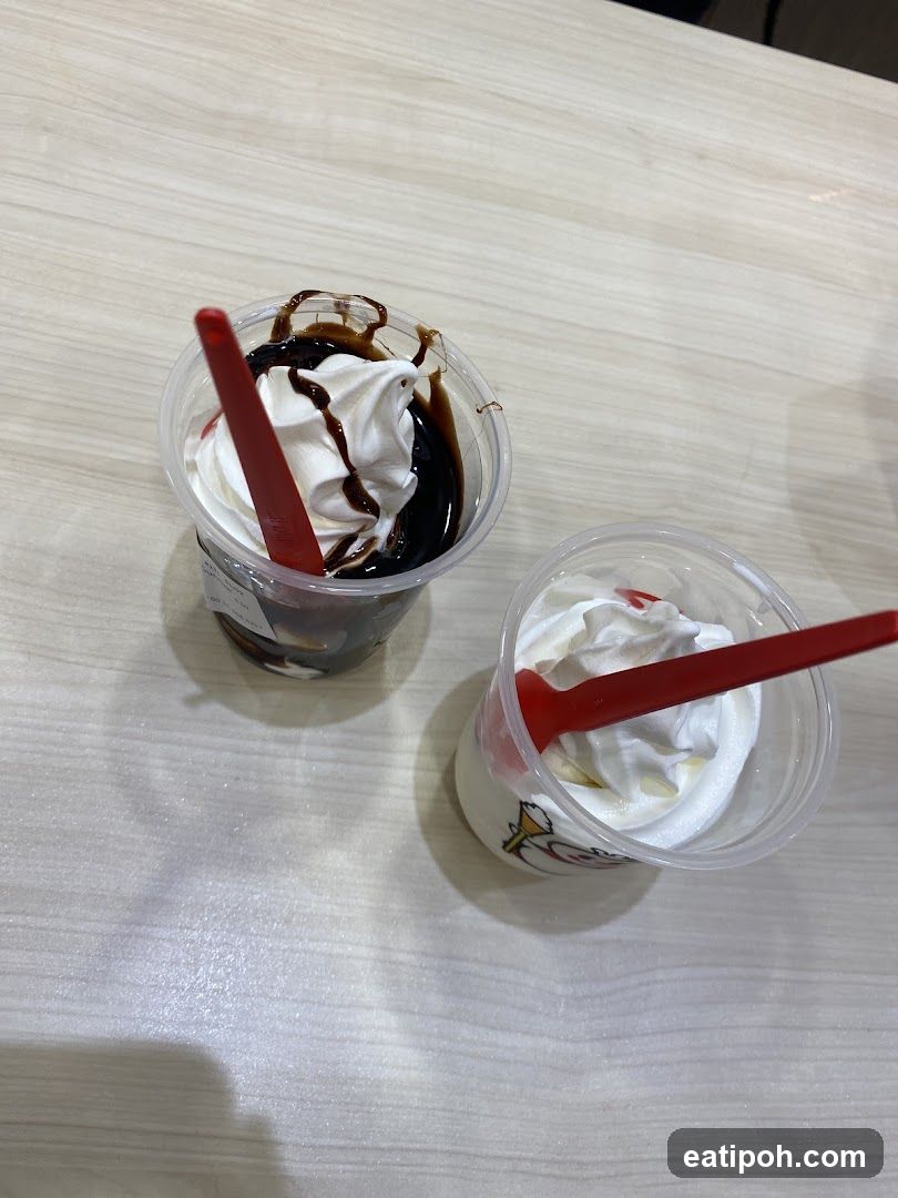 Two dessert cups on a table