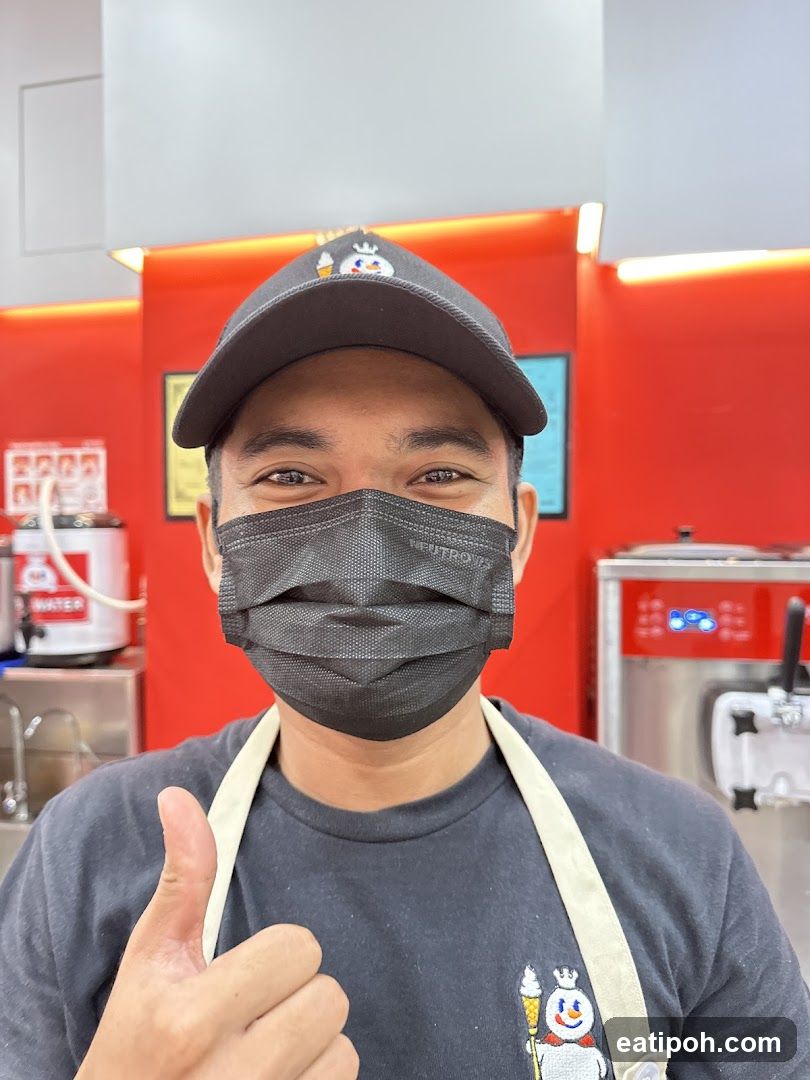 Staff Member in Ice Cream Shop Interior