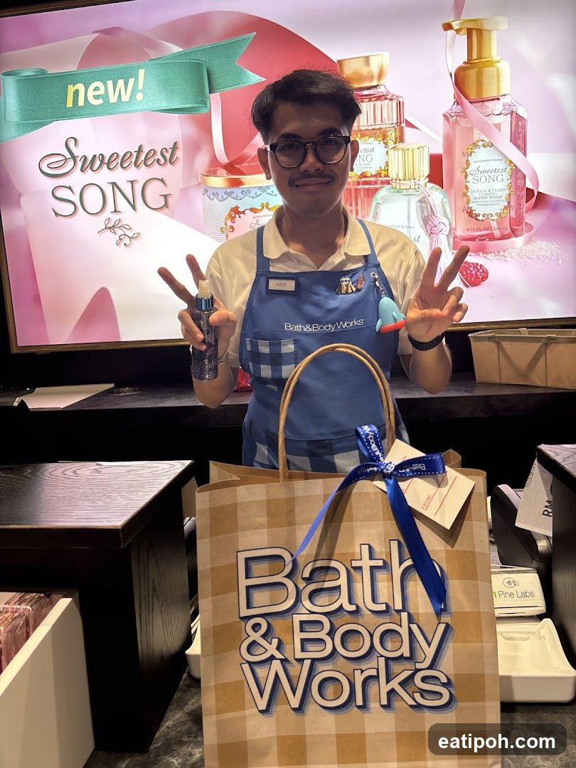 Bath & Body Works employee with shopping bag