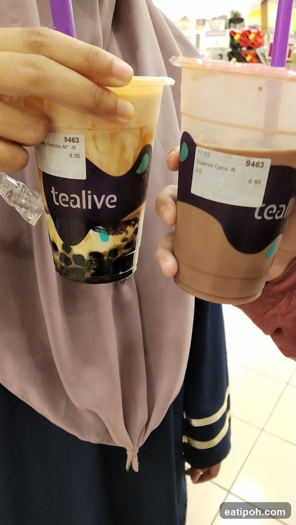 Tealive beverages held by customers