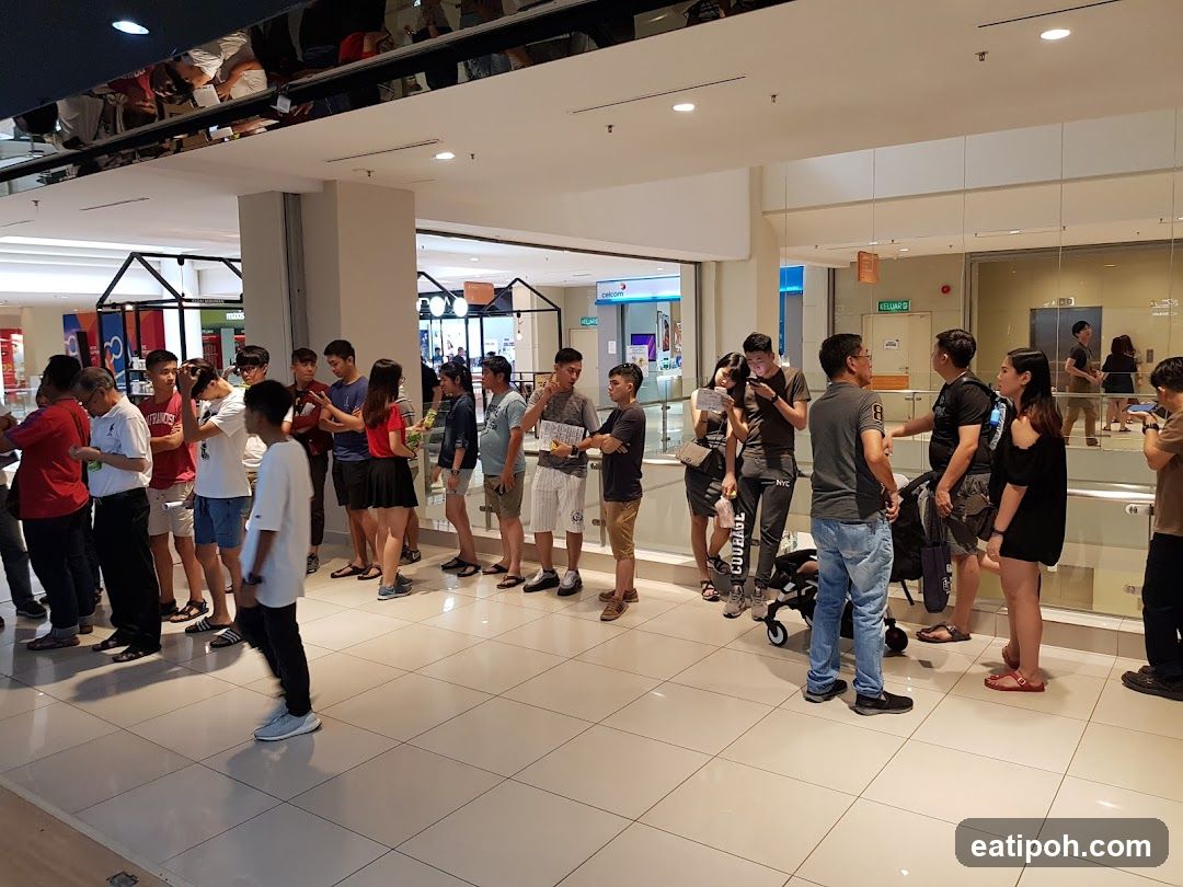 Group of People in Mall Interior