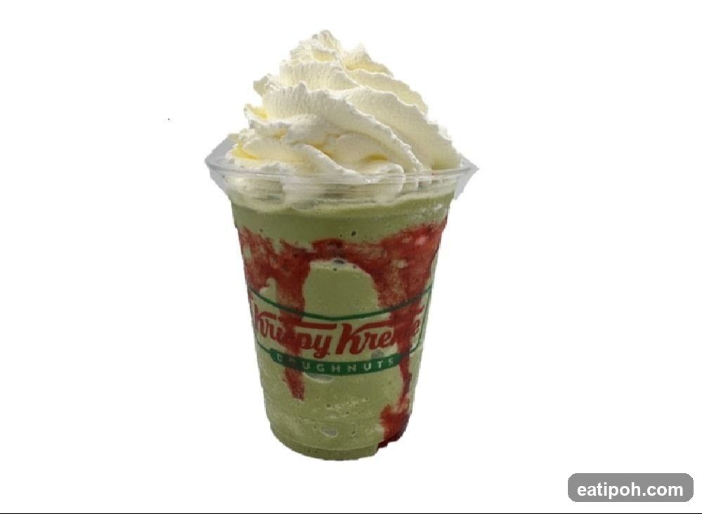 Green Frappe with Whipped Cream and Strawberry Drizzle