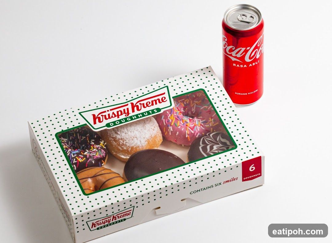 Krispy Kreme Doughnuts Box and Coca-Cola Can