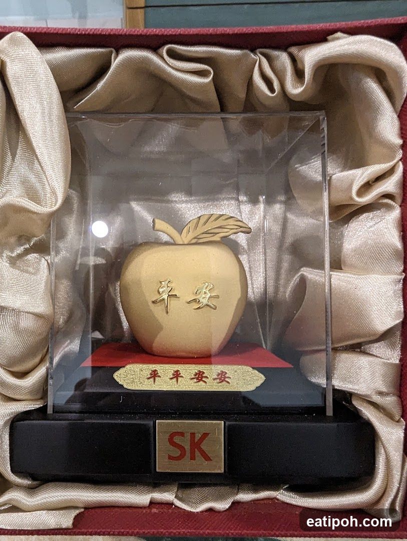 Gift Box with Apple Sculpture