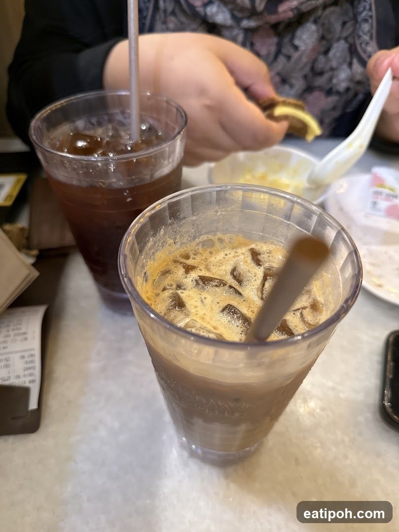Tabletop with iced beverages and food