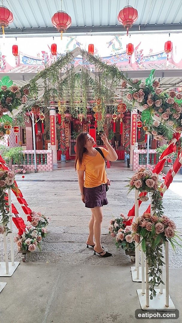 Woman at Decorated Entrance