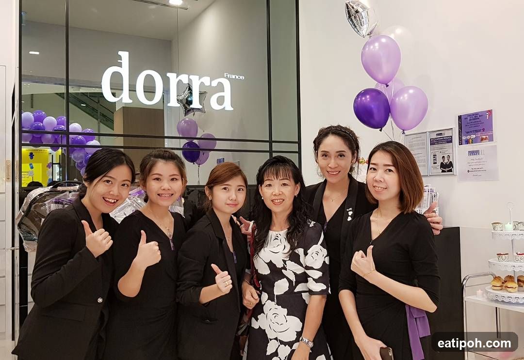 Group photo at Dorra France storefront
