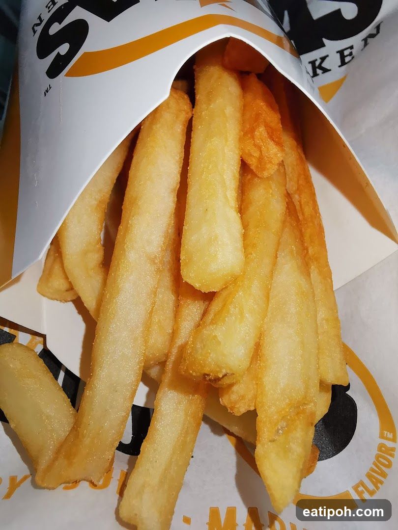 Fries in branded paper bag
