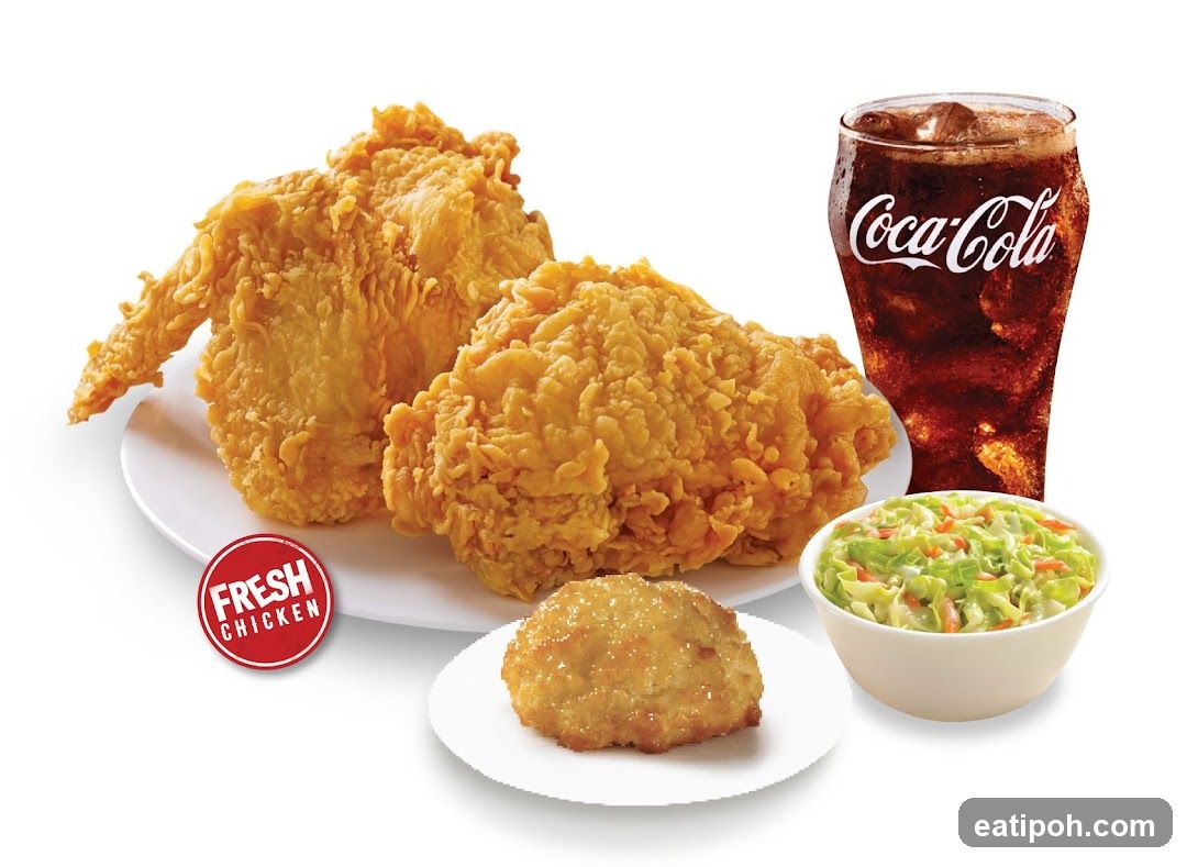 Fried Chicken Meal with Soda and Side Dishes