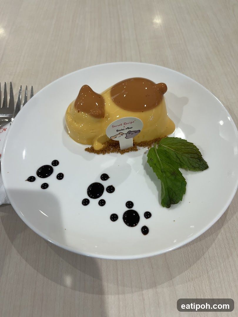 Cat-shaped dessert on plate