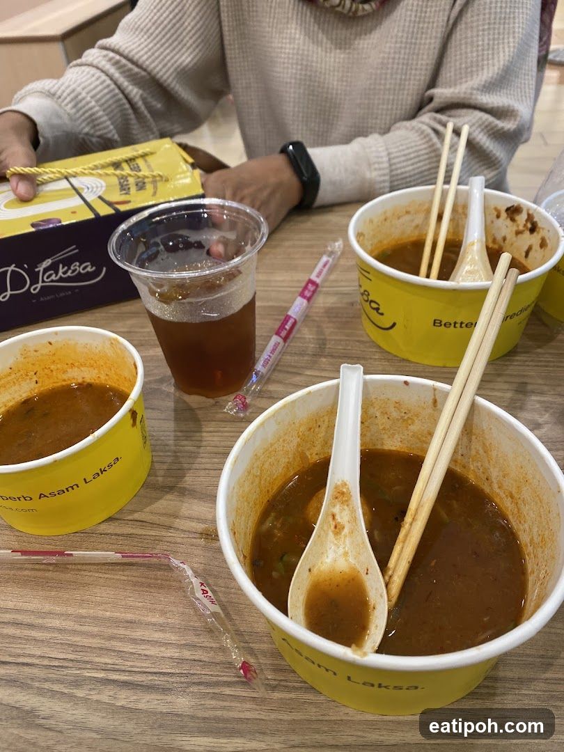 Asam Laksa meal at dining table