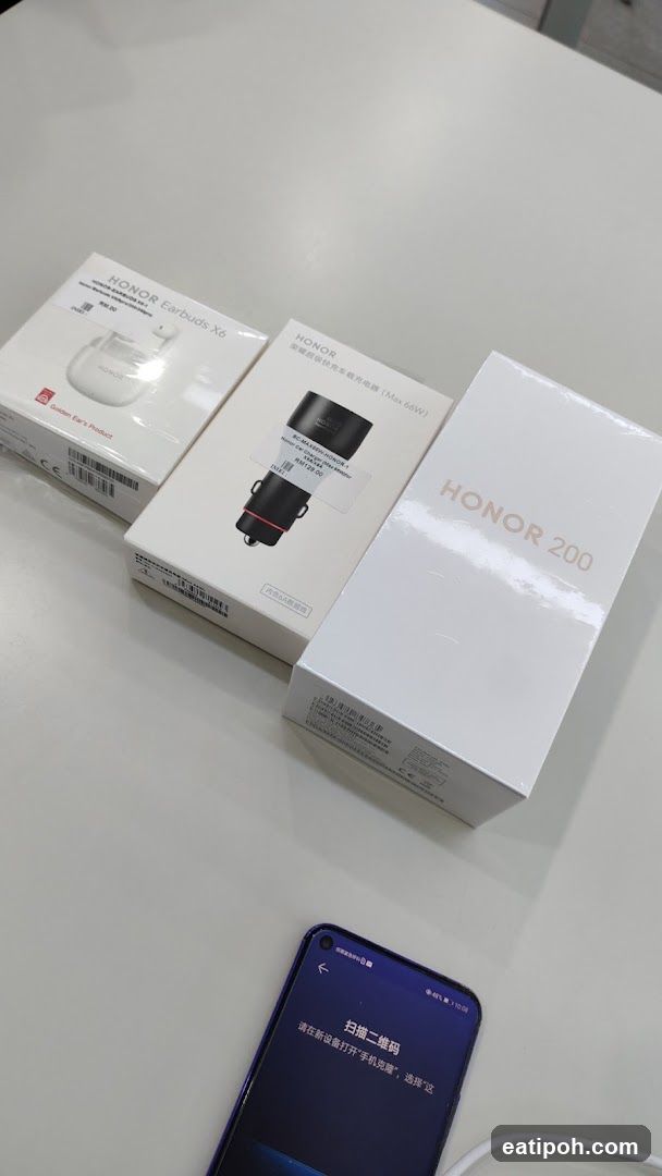 Honor Product Boxes and Phone on Table
